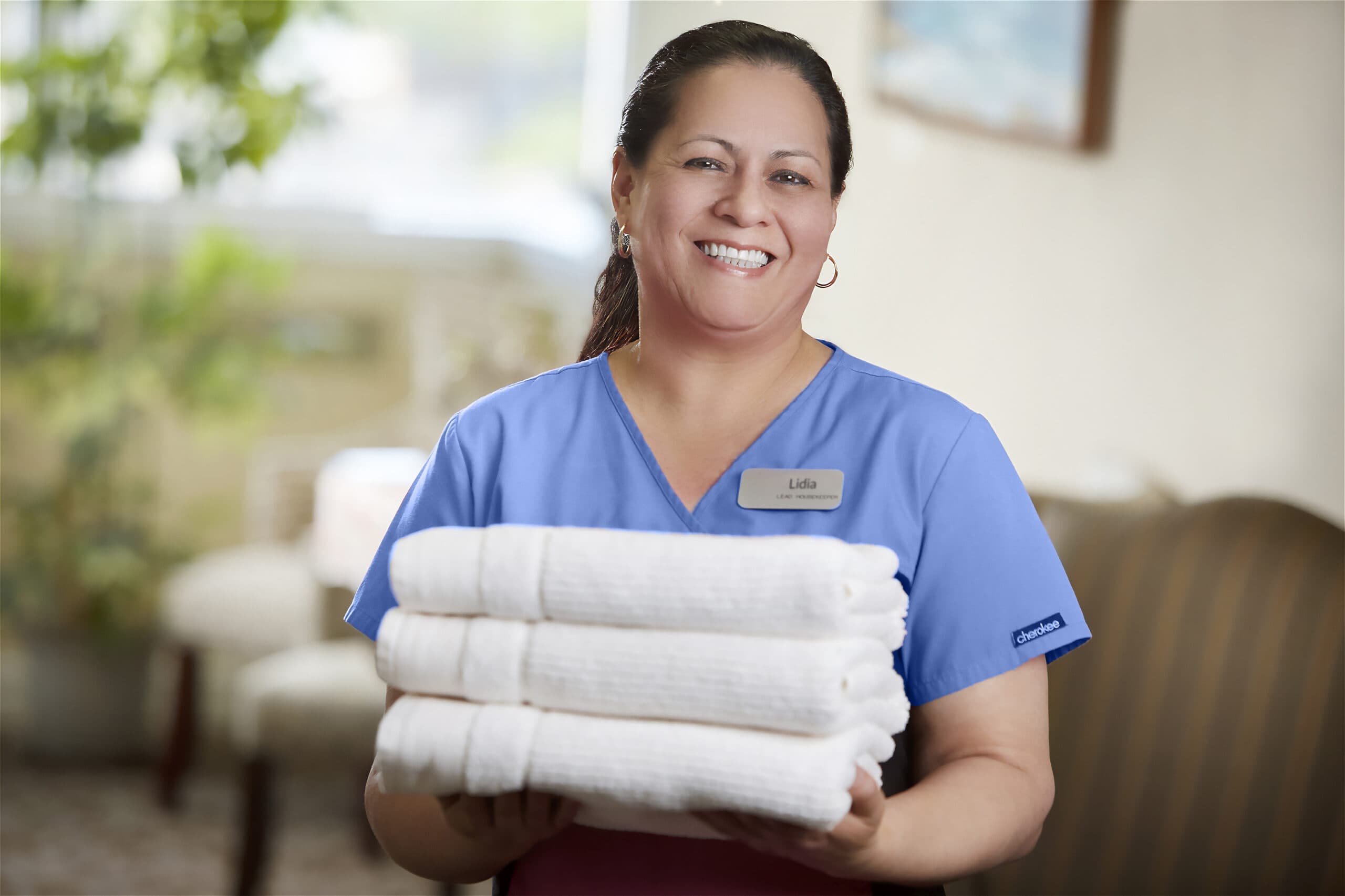 The Neighborhood Staff with Towels